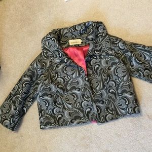 Silver and black jacket.